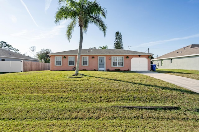 ranch-style house with a garage and a front lawn