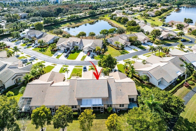 drone / aerial view featuring a water view