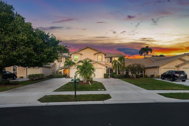 view of front of property with a lawn