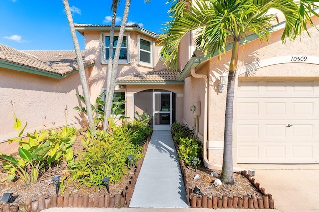 property entrance featuring a garage