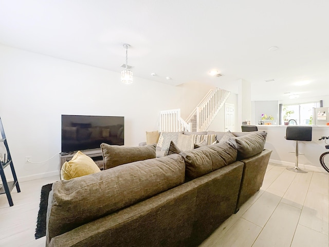 living room with light hardwood / wood-style floors