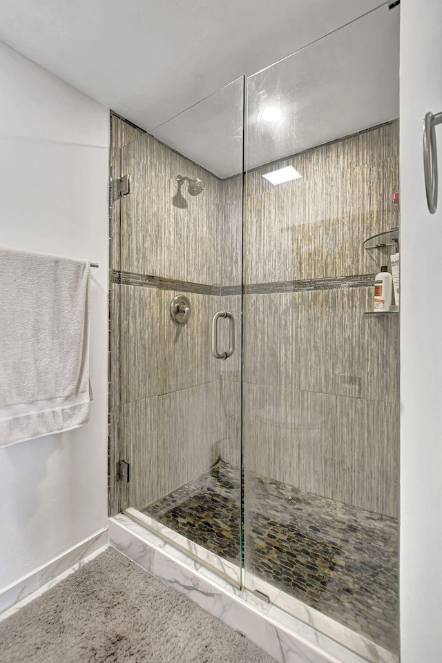 bathroom with an enclosed shower