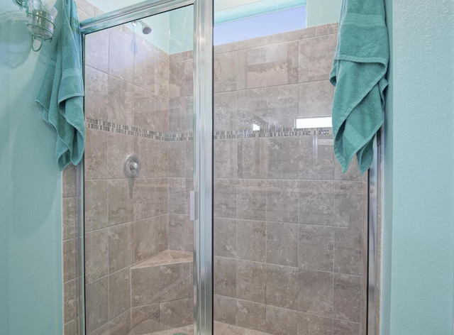 bathroom with an enclosed shower