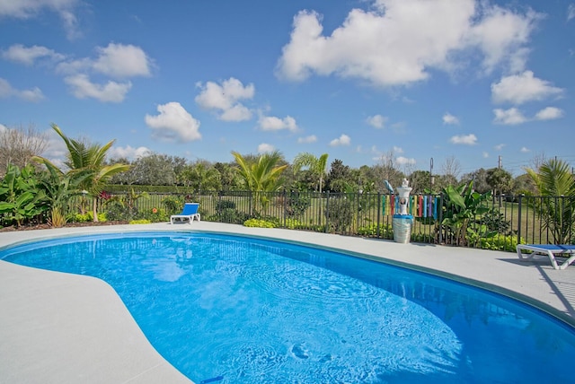 view of pool featuring a fenced in pool and fence