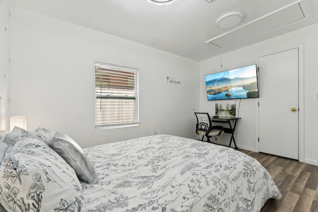 bedroom featuring dark wood-type flooring