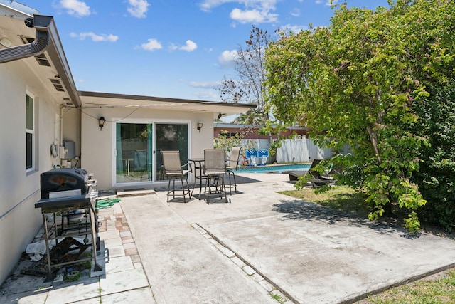 view of patio / terrace featuring a fenced in pool