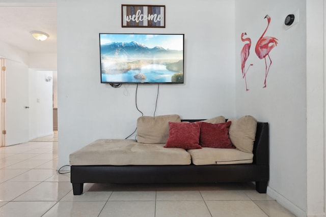 living room with tile patterned floors