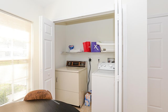 laundry room featuring washer and clothes dryer