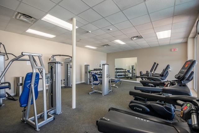 workout area with a drop ceiling