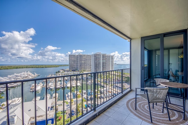 balcony featuring a water view