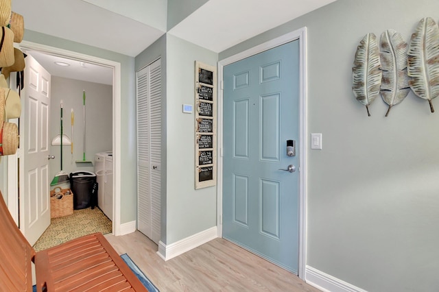 entrance foyer featuring light wood-type flooring