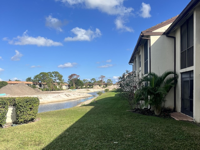 view of yard with a water view