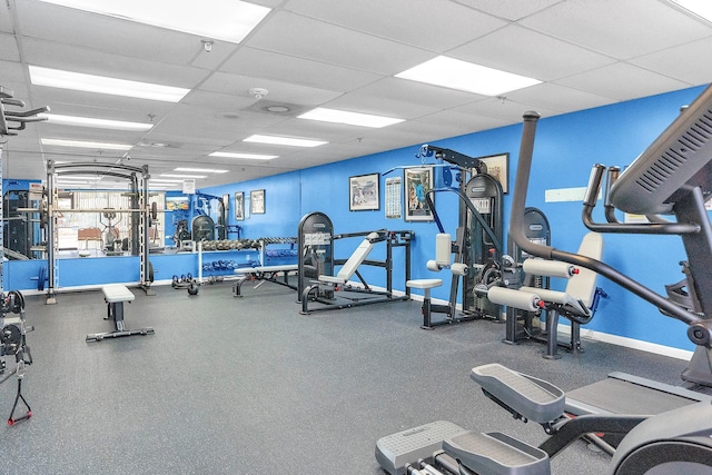 workout area with a drop ceiling