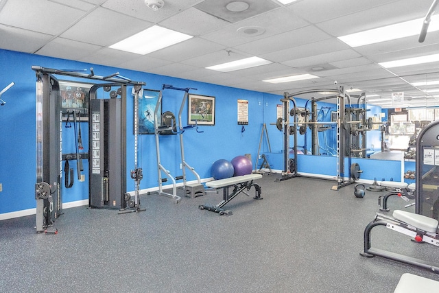 workout area with a drop ceiling