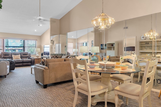 dining space featuring high vaulted ceiling, carpet, and a notable chandelier