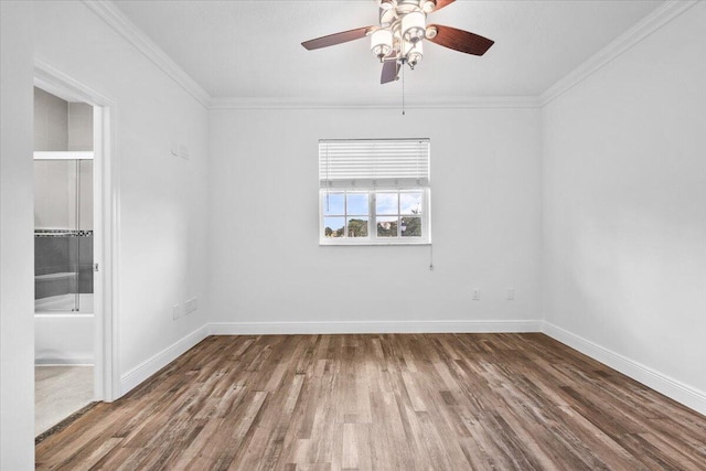 unfurnished room featuring hardwood / wood-style floors, ornamental molding, and ceiling fan