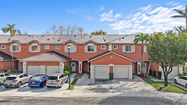 view of property with a garage