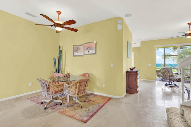 dining room with ceiling fan