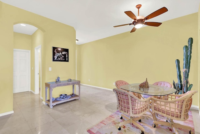 dining room featuring ceiling fan