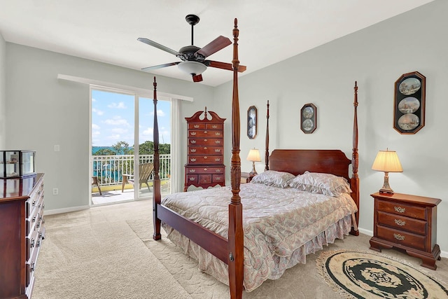 bedroom featuring ceiling fan, light colored carpet, and access to exterior