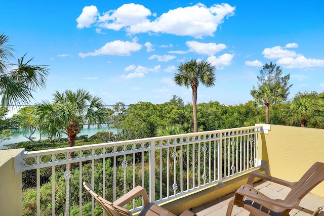 balcony featuring a water view