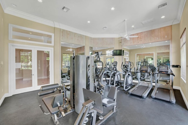 gym with ornamental molding, ceiling fan, and french doors