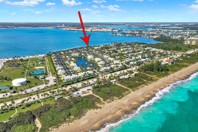 aerial view featuring a beach view and a water view