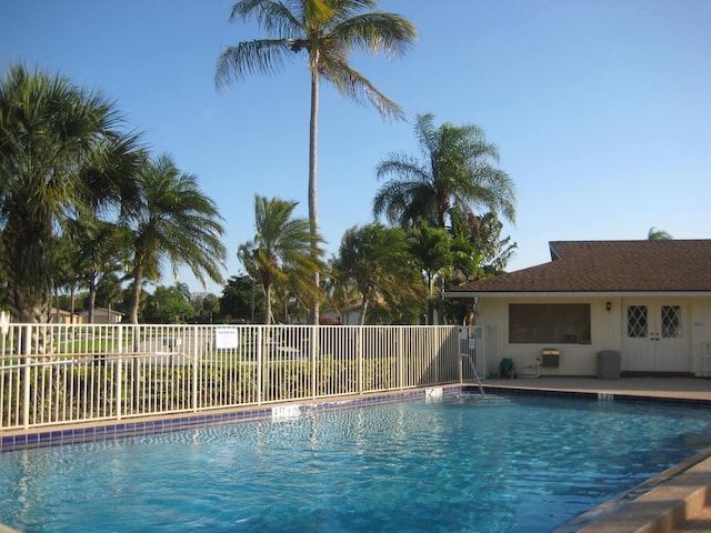 community pool with fence