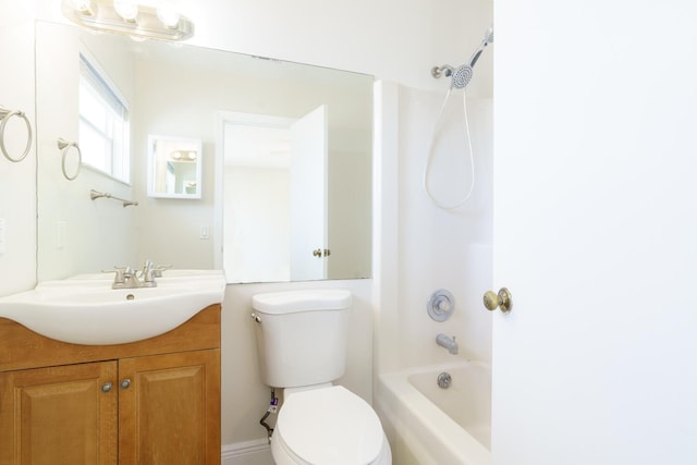 full bathroom featuring toilet, bathtub / shower combination, and vanity