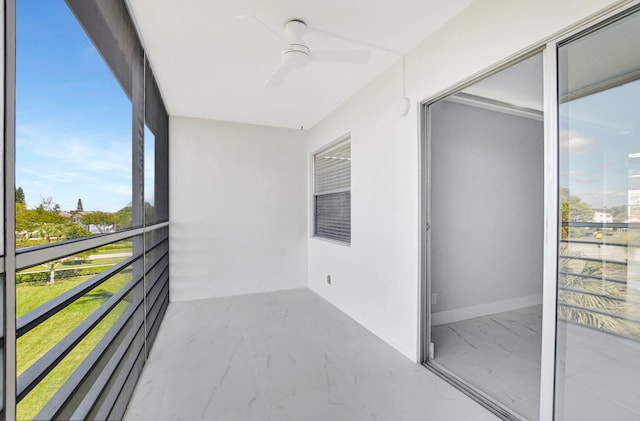 balcony featuring a ceiling fan