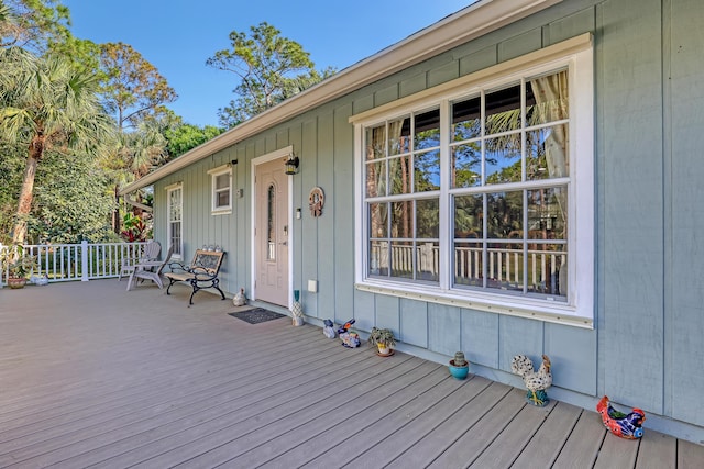 wooden deck featuring covered porch