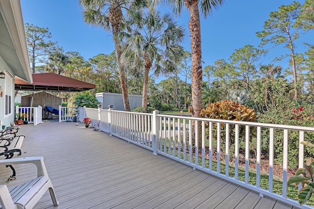 deck featuring a storage unit