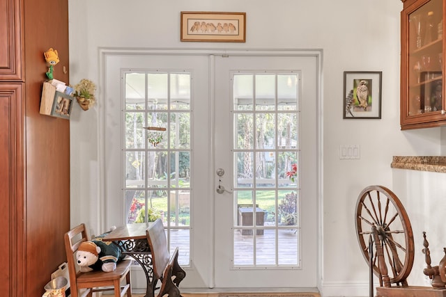 entryway with a wealth of natural light and french doors