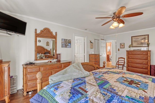 bedroom featuring crown molding, ceiling fan, and hardwood / wood-style flooring