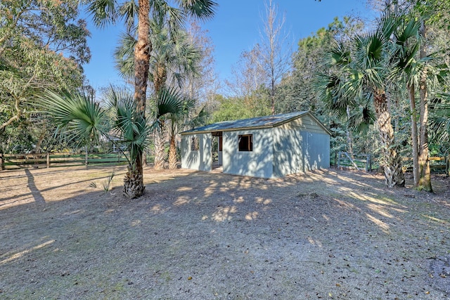 exterior space with a storage shed