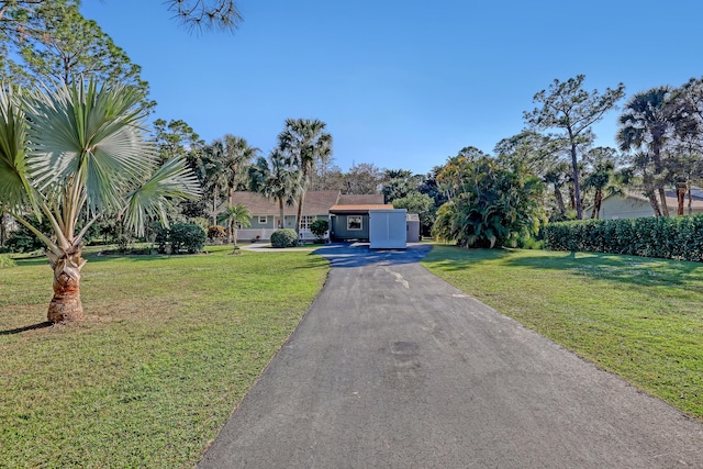 view of front of property with a front lawn