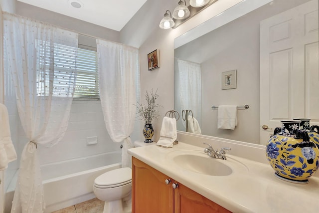 full bathroom featuring tile patterned flooring, vanity, shower / tub combo with curtain, and toilet