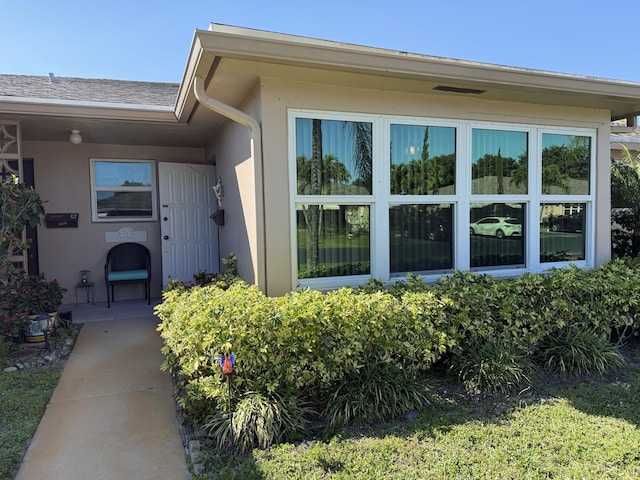 1292 High Point Pl S Unit B, Delray Beach, FL 33445 - property entrance featuring stucco siding