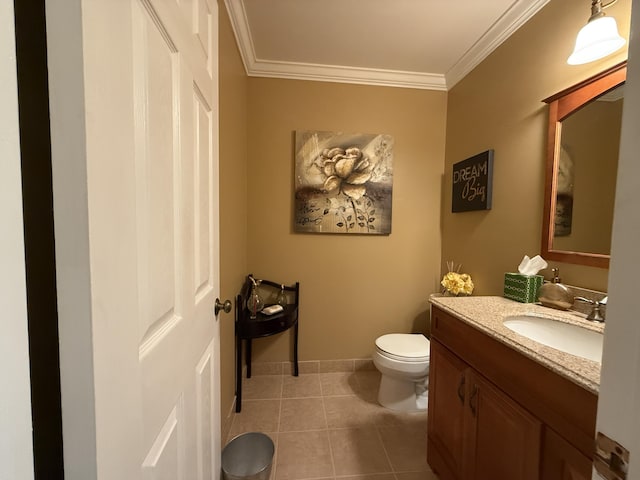 1292 High Point Pl S Unit B, Delray Beach, FL 33445 - half bathroom with vanity, toilet, ornamental molding, tile patterned flooring, and baseboards