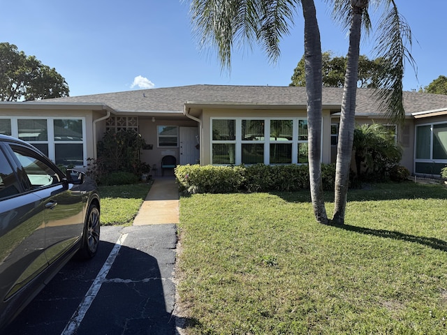 1292 High Point Pl S Unit B, Delray Beach, FL 33445 - single story home featuring a front lawn