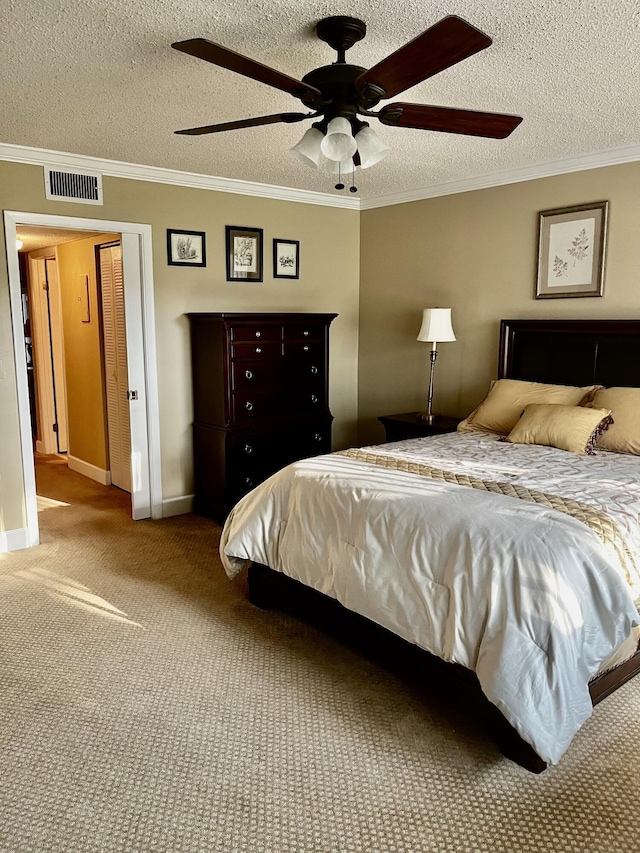 1292 High Point Pl S Unit B, Delray Beach, FL 33445 - carpeted bedroom featuring ornamental molding, a textured ceiling, and ceiling fan