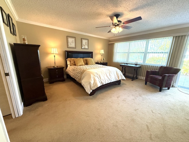 1292 High Point Pl S Unit B, Delray Beach, FL 33445 - bedroom featuring multiple windows, light carpet, ornamental molding, a textured ceiling, and baseboards