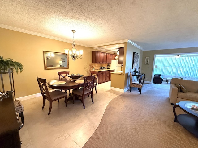 1292 High Point Pl S Unit B, Delray Beach, FL 33445 - dining room featuring crown molding, a chandelier, a textured ceiling, and baseboards