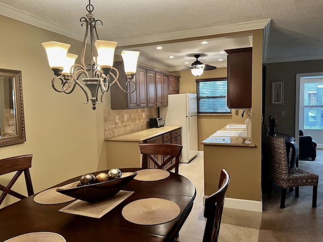 1292 High Point Pl S Unit B, Delray Beach, FL 33445 - dining room with ornamental molding, ceiling fan, recessed lighting, a chandelier, and a textured ceiling