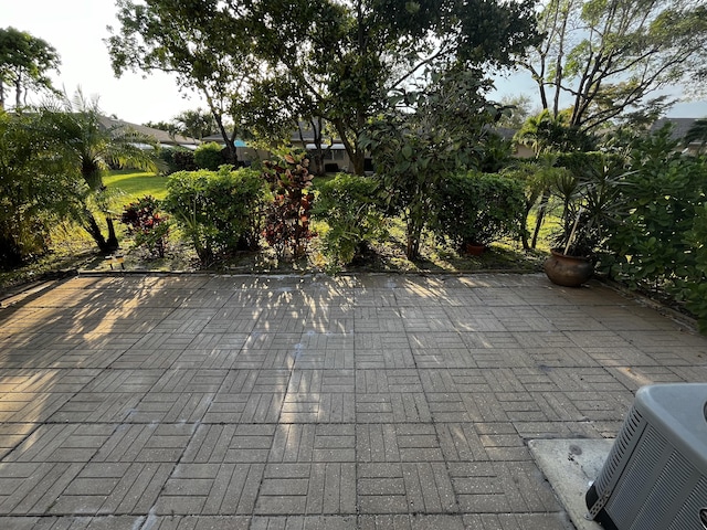 1292 High Point Pl S Unit B, Delray Beach, FL 33445 - view of patio / terrace featuring central AC unit