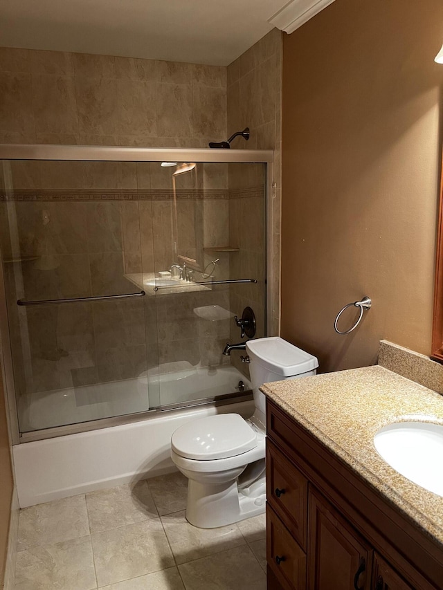 1292 High Point Pl S Unit B, Delray Beach, FL 33445 - full bath featuring enclosed tub / shower combo, toilet, vanity, and tile patterned floors