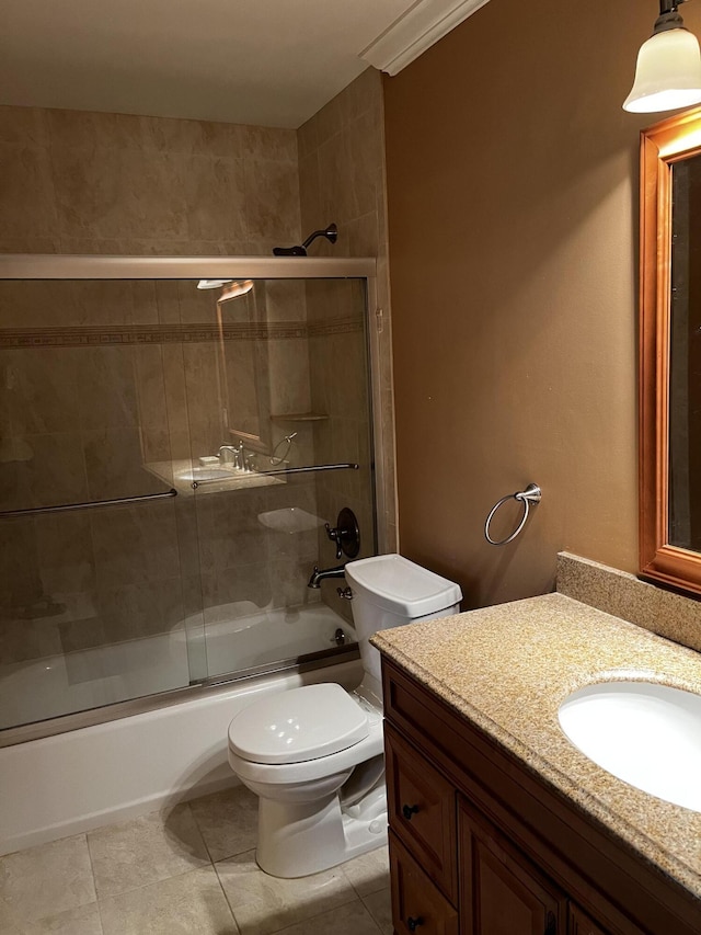 1292 High Point Pl S Unit B, Delray Beach, FL 33445 - bathroom with bath / shower combo with glass door, vanity, toilet, and tile patterned flooring