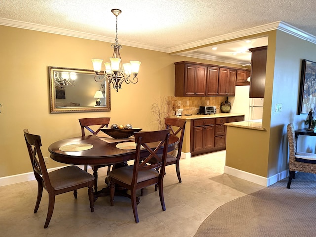 1292 High Point Pl S Unit B, Delray Beach, FL 33445 - dining area with crown molding, a chandelier, a textured ceiling, and baseboards