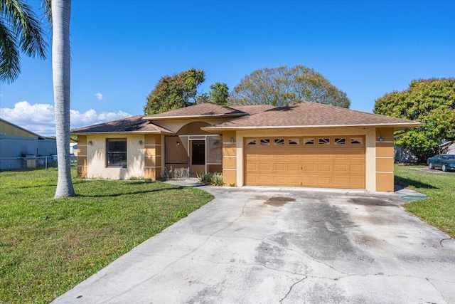 single story home with a garage and a front yard