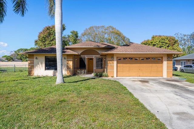 view of front facade featuring a garage and a front yard